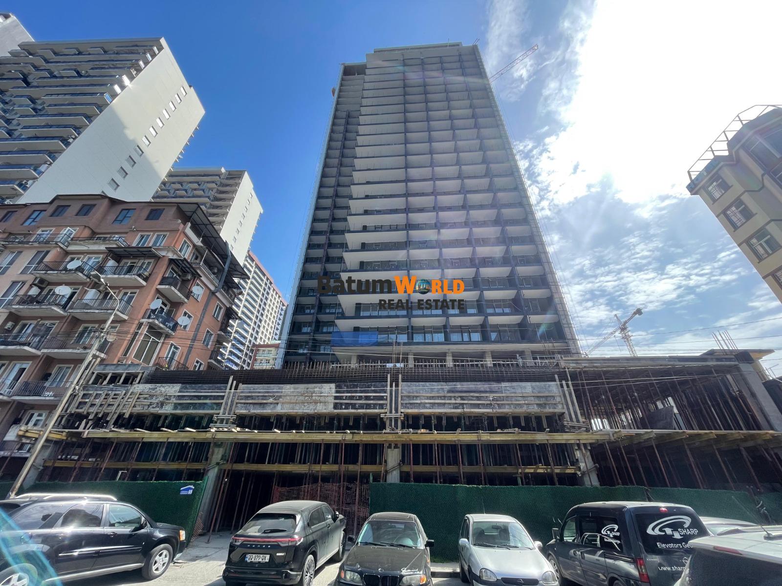 🌟 2025-AA07 – 1310 – Batum Sahil Kulesinde Satılık Beyaz Çerçeveli Stüdyo Daire-33,29 m2-51.599$